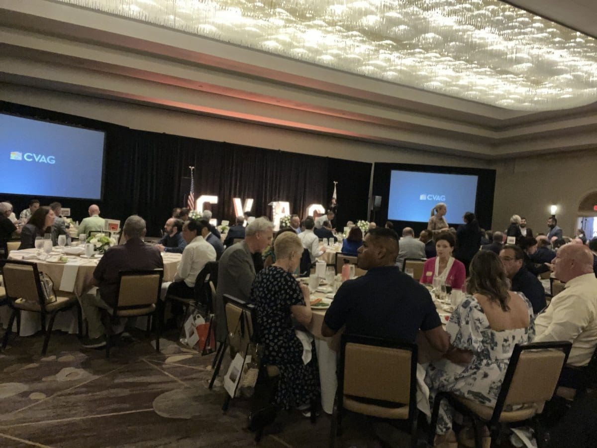 People networking at a formal event