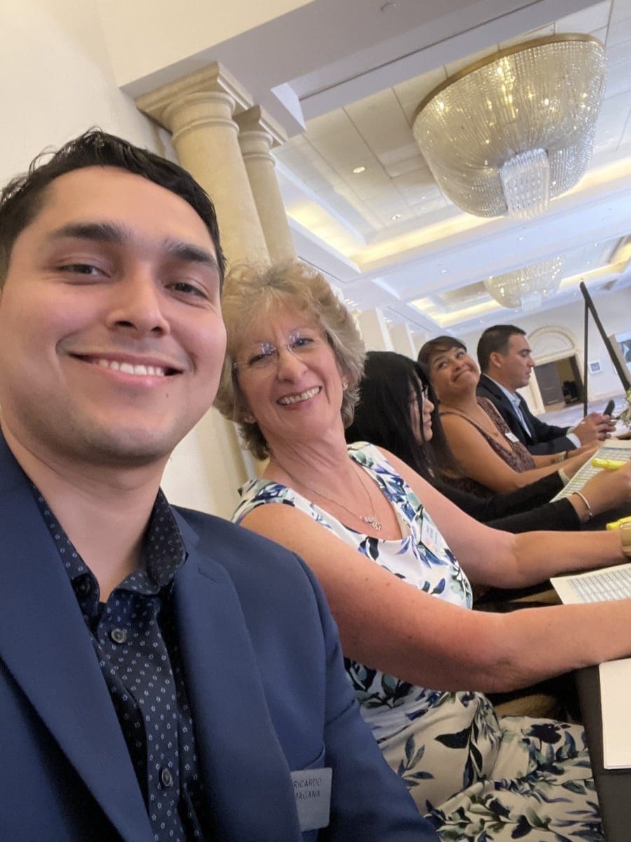 Attendees at a formal event table
