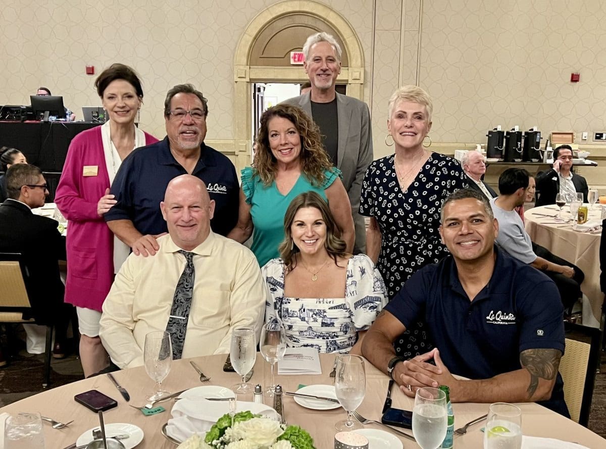 Friends gathered at formal occasion